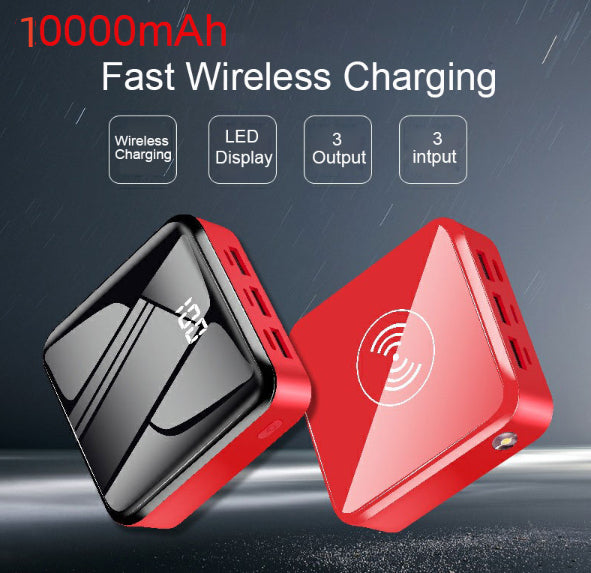 Red and black power bank with wireless charging feature on a dark background