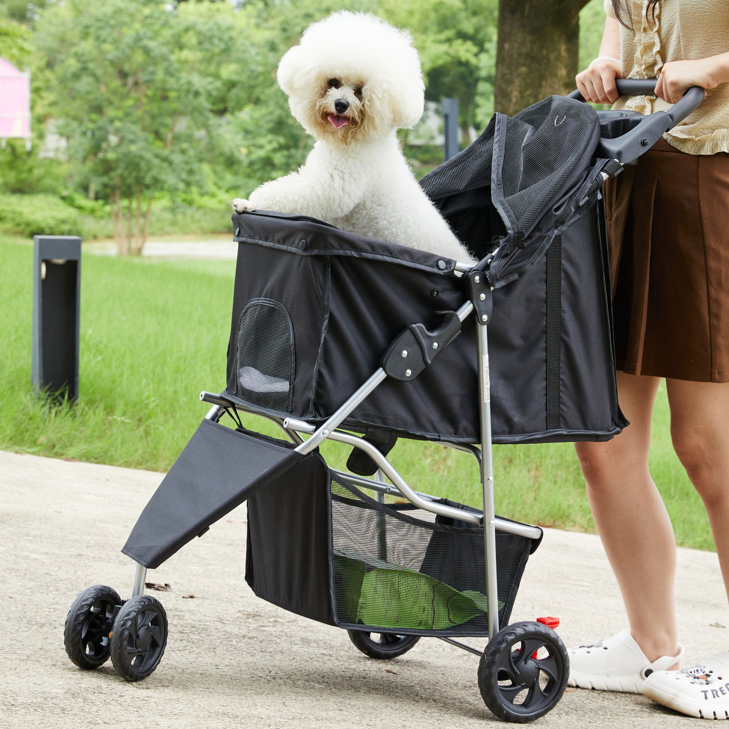 Pet Stroller for Dogs and Cats Foldable,Lightweight, and Durable Ideal for Small to Medium Pets  Includes Storage Basket