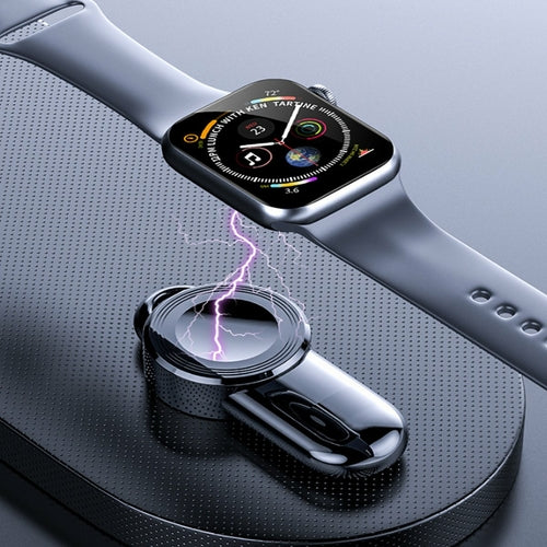 Smartwatch being charged on a magnetic charging stand with lightning effect