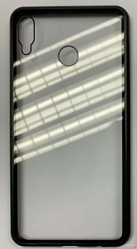 Phone case with a reflective surface showing blurred indoor lights