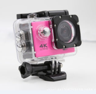Pink and black action camera with 4K Ultra HD label on a white background