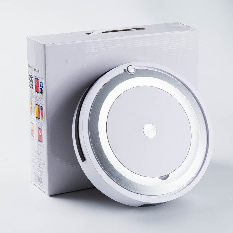 Round electronic device with a white box on a light gray background