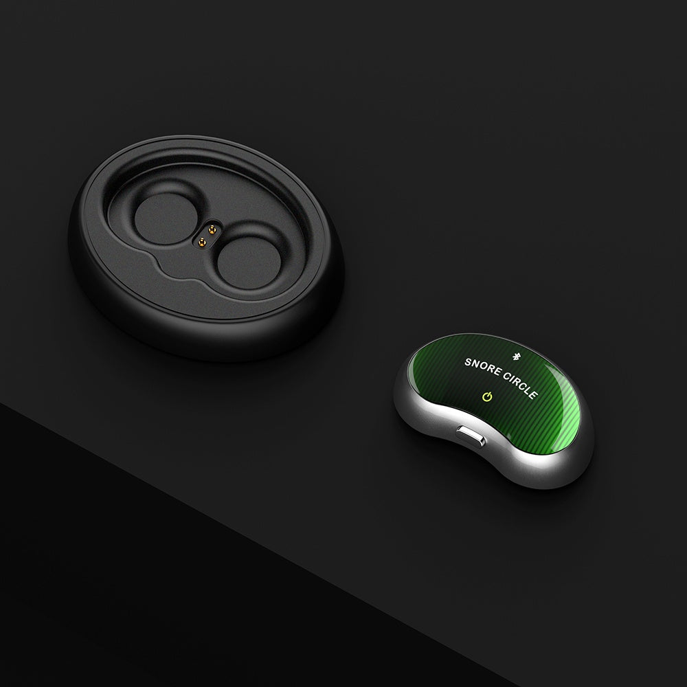 Black electronic device with a green display on a dark background