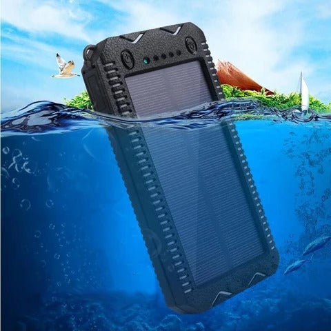 Black solar power bank floating on water with a scenic background