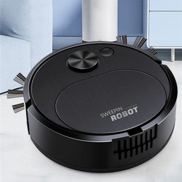 Black robot vacuum cleaner with 'Sweepin' branding on a white floor.