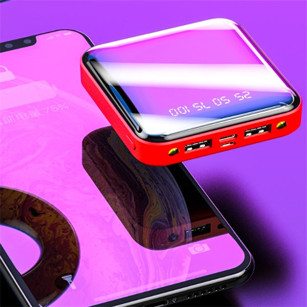Red portable charger with multiple USB ports on a purple background