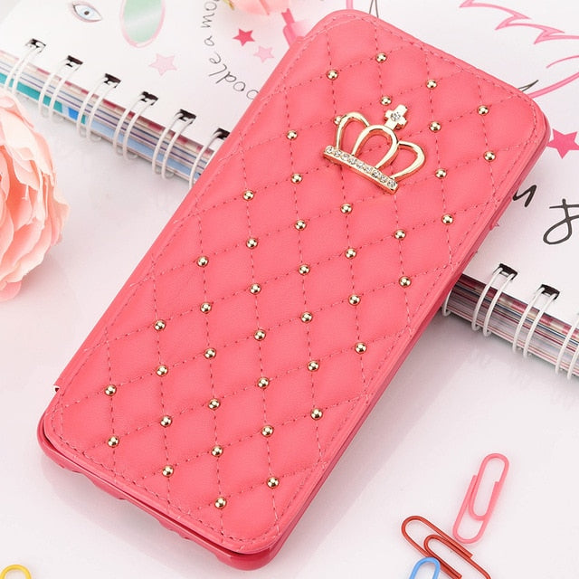 Pink phone case with decorative elements on a light background