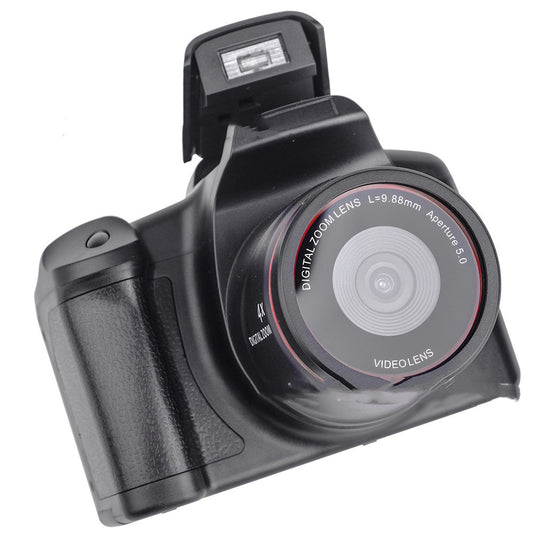 Digital camera with lens and flash on a white background