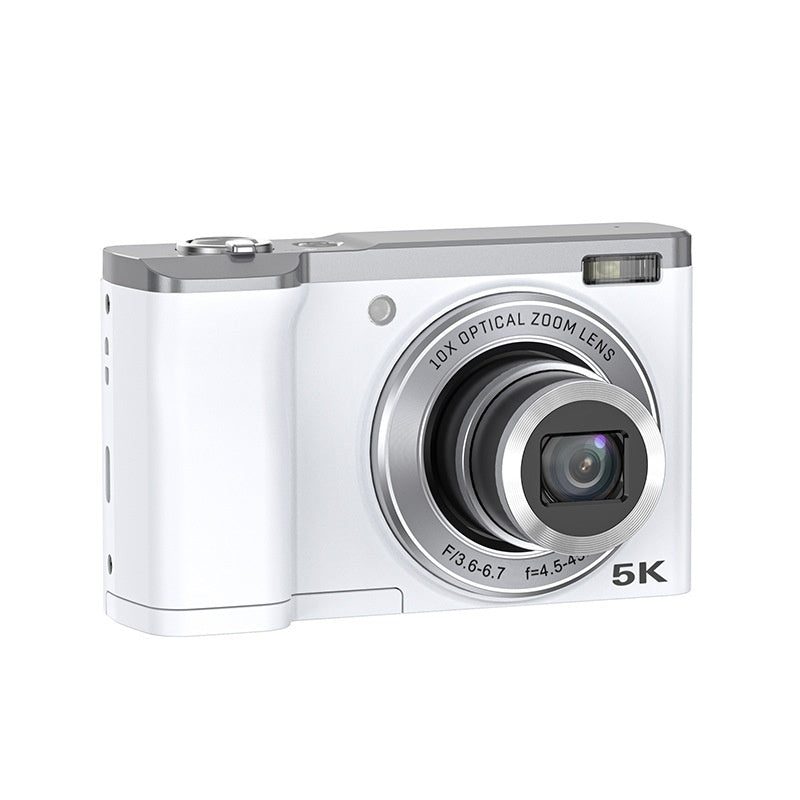 White digital camera with silver accents on a white background