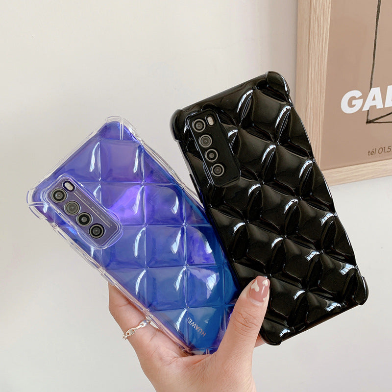 Two phone cases, one blue and one black, held by a hand with a blurred background.