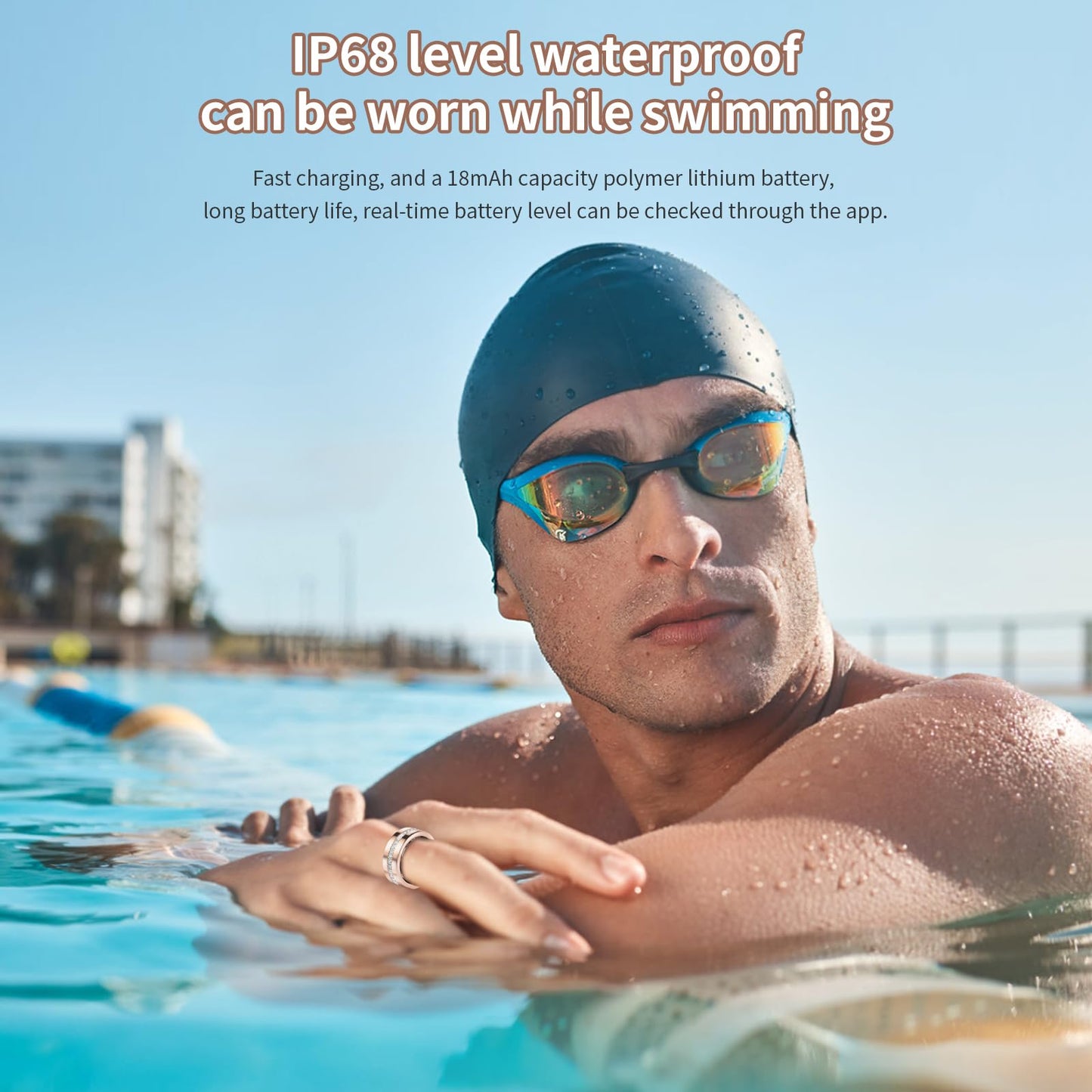 Man wearing swim goggles and cap in a pool with text about waterproof rating and battery life.