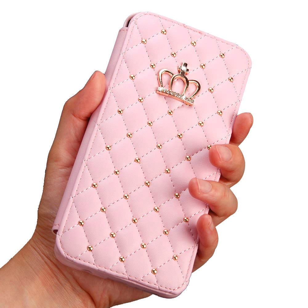 Pink quilted phone case with a crown emblem held in a hand against a white background