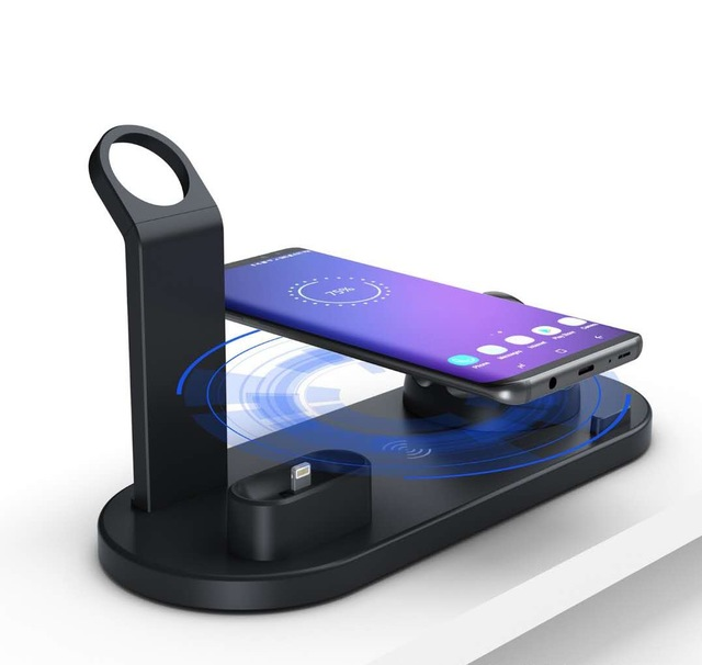 Black wireless charging stand with two devices on a white background