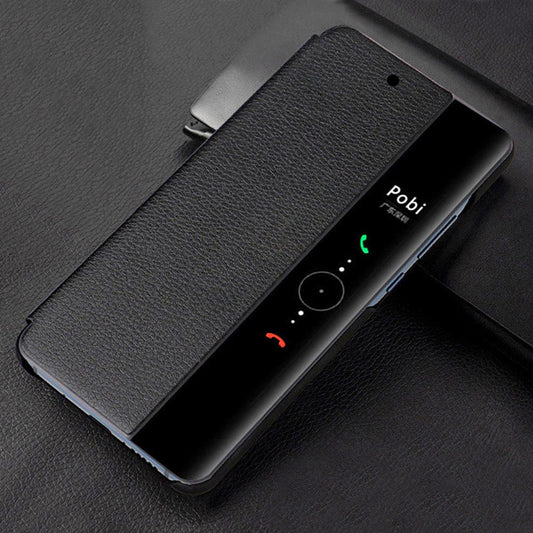 Black phone case with a textured finish on a dark surface