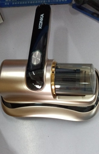 Gold and black door handle with 'Konka' branding on a white surface