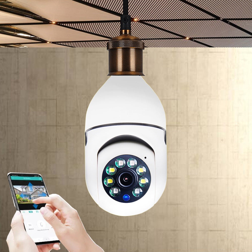 Smart camera light bulb with smartphone app control on a wooden background