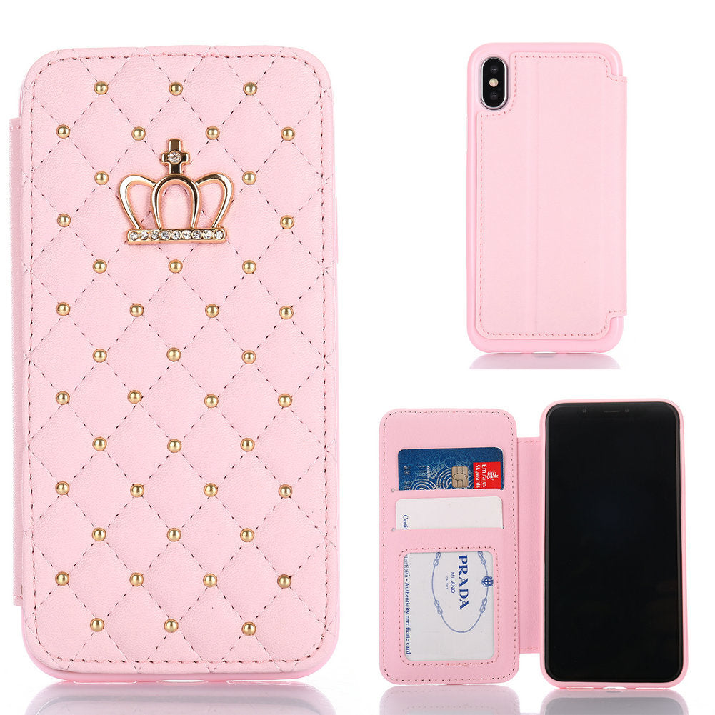 Pink phone case with crown design and card slots on a white background