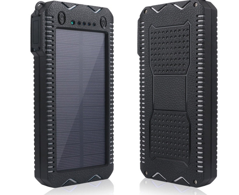 Black rugged power bank with textured surface on a white background