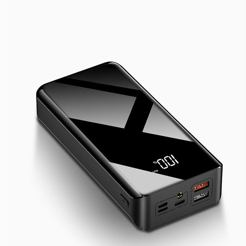 Black power bank with digital display on a white background