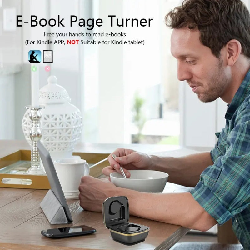 Man using an e-book page turner with a tablet on a table.