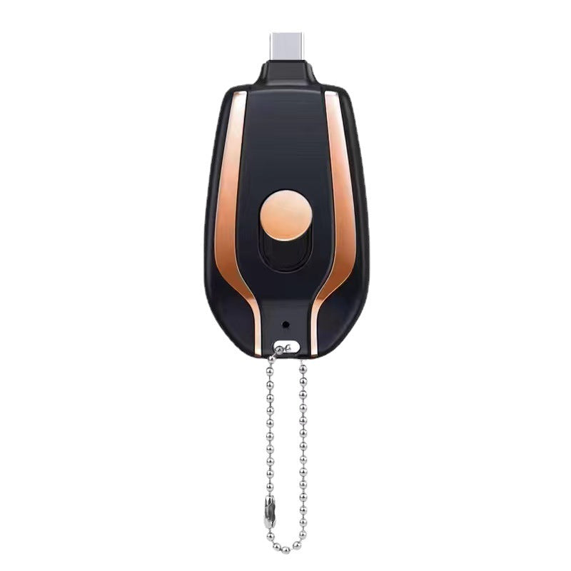 Black and rose gold pull switch on a white background