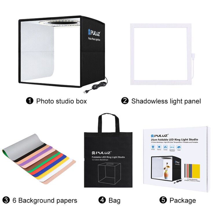 Puluz photo studio kit with photo studio box, shadowless light panel, background papers, bag, and packaging on a white background.