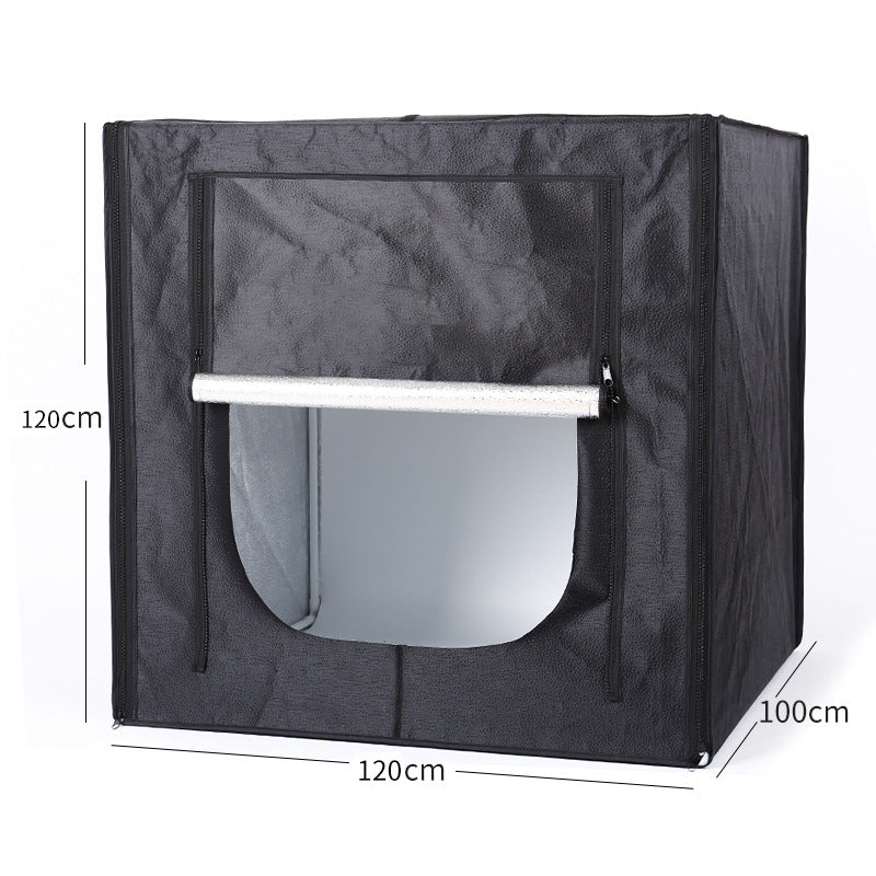 Black photo studio light tent with dimensions indicated on a white background
