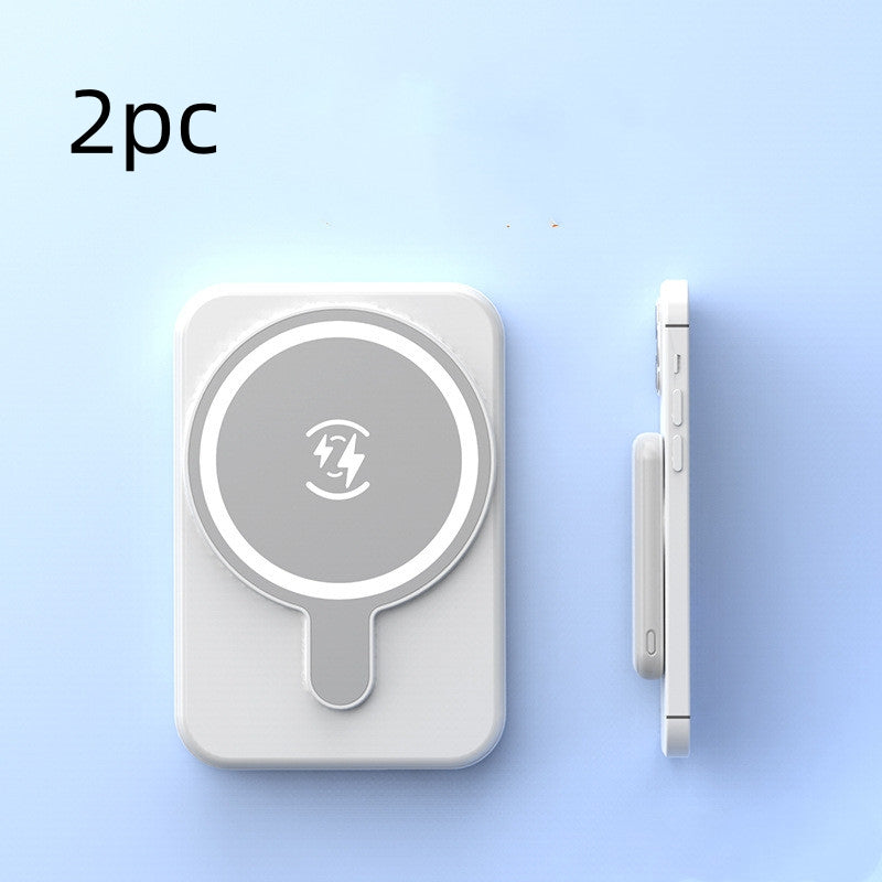 Two wireless charging pads on a light blue background